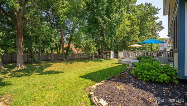 a bathroom with a sink vanity and a mirror