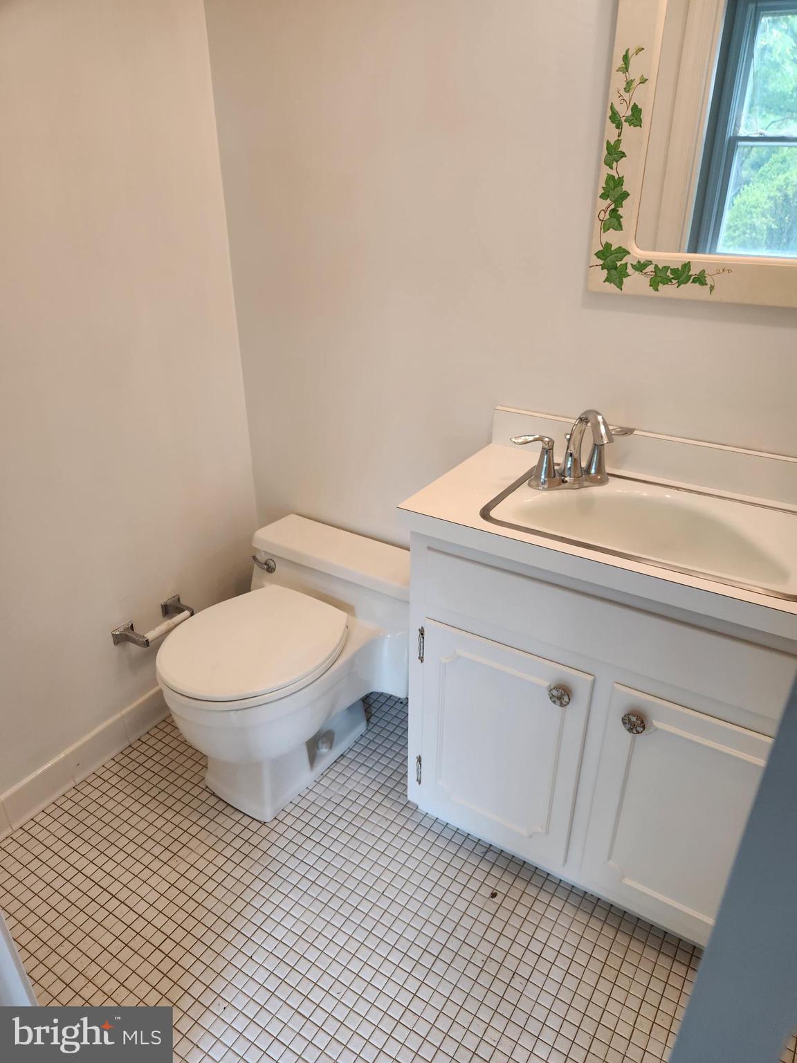 2000 Rectortown Road Delaplane, VA 20144 - Photo 15 of 16 a bathroom with a toilet a sink and mirror
