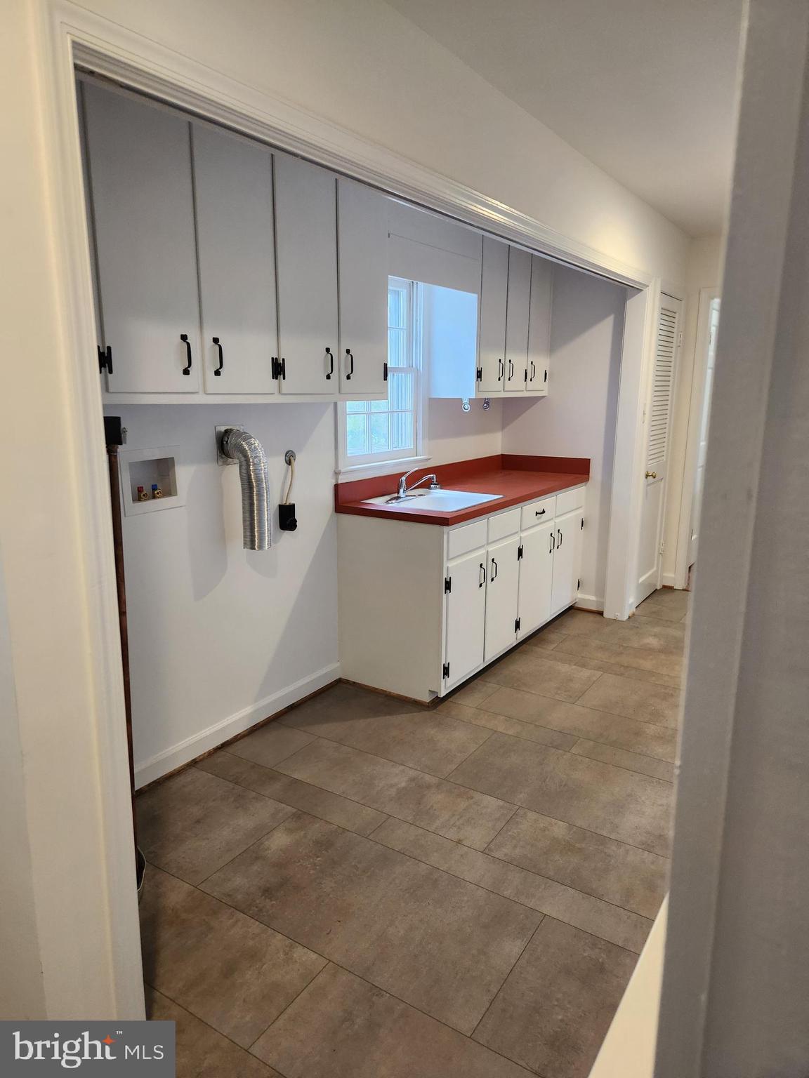 2000 Rectortown Road Delaplane, VA 20144 - Photo 7 of 16 a large white kitchen with cabinets