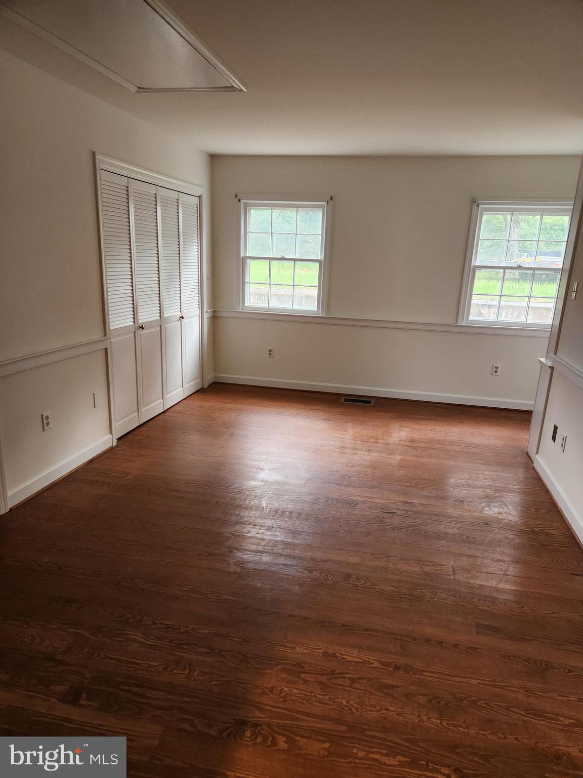 2000 Rectortown Road Delaplane, VA 20144 - Photo 10 of 16 an empty room with wooden floor and windows