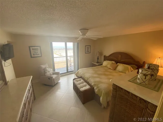 a bathroom with a double vanity sink mirror and shower