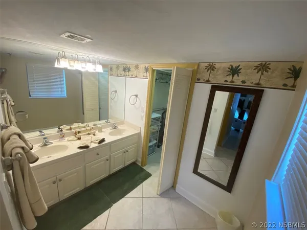 a bathroom with a sink and toilet