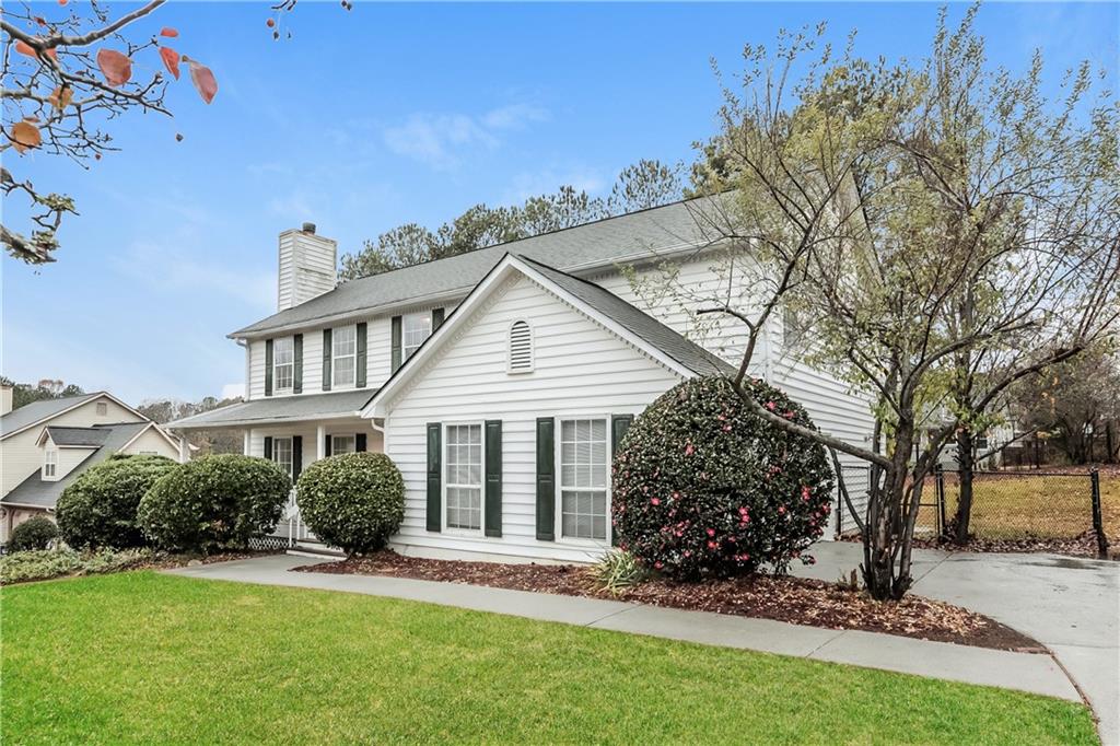 1735 Summit Edge Circle Loganville, GA 30052 - Photo 1 of 1 a view of a house with a yard