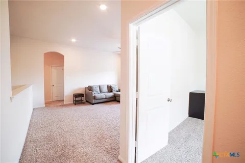 a view of living room and furniture