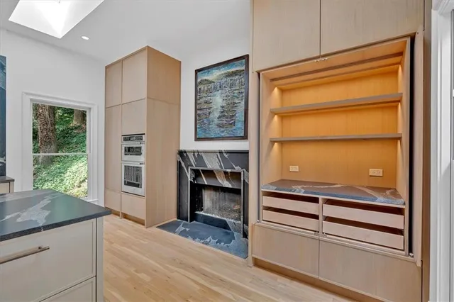 a view of balcony with wooden floor
