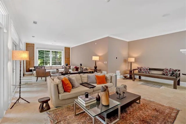 a backyard of a house with a garden and plants