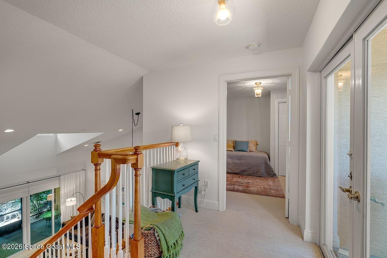 1629 Baseline Lane Vero Beach, FL 32967 - Photo 15 of 29 a view of a livingroom with furniture and stairs