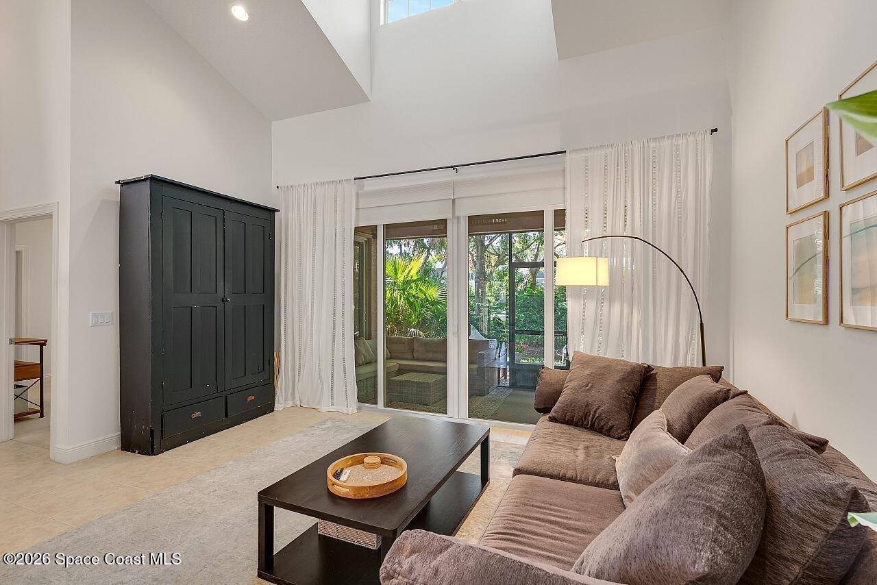 1629 Baseline Lane Vero Beach, FL 32967 - Photo 2 of 29 a living room with furniture and a large window