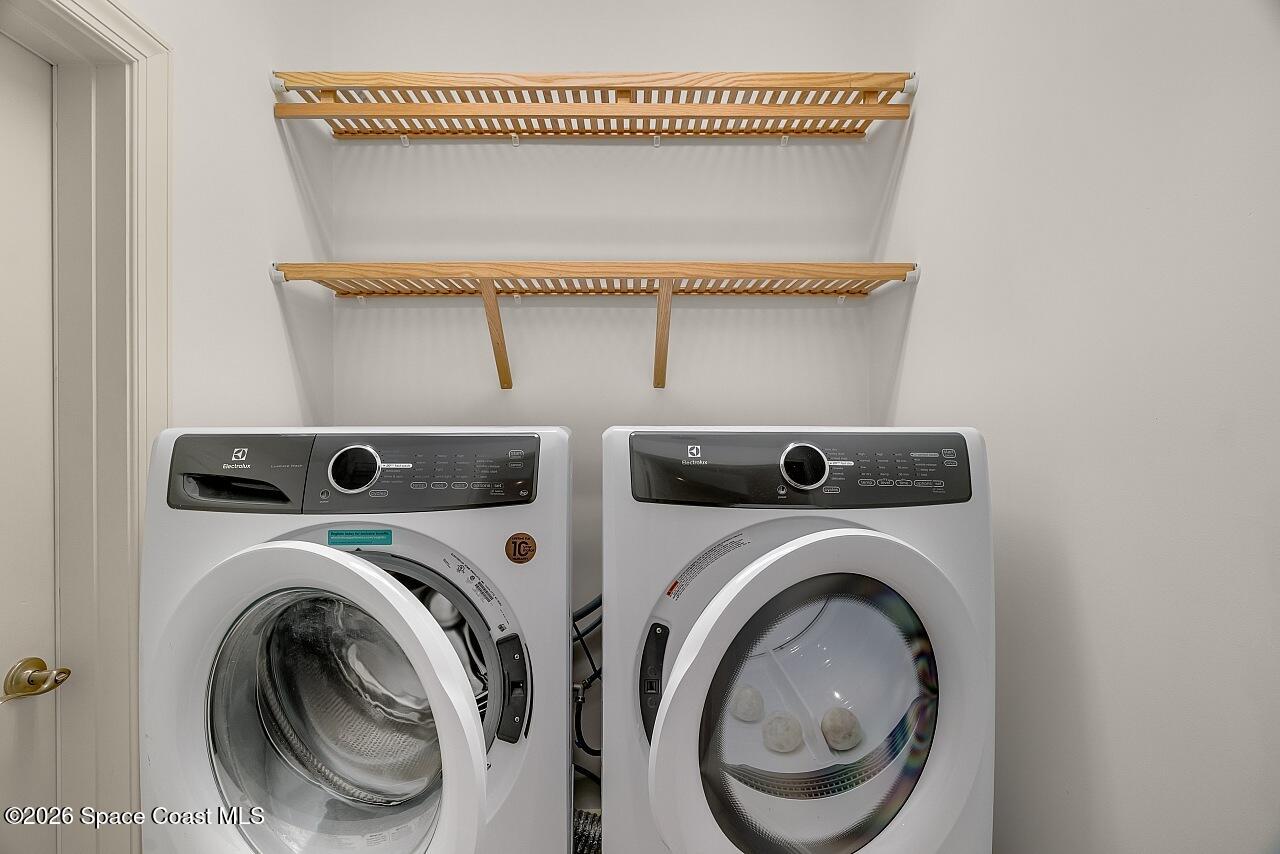 1629 Baseline Lane Vero Beach, FL 32967 - Photo 24 of 29 a utility room with dryer and washer