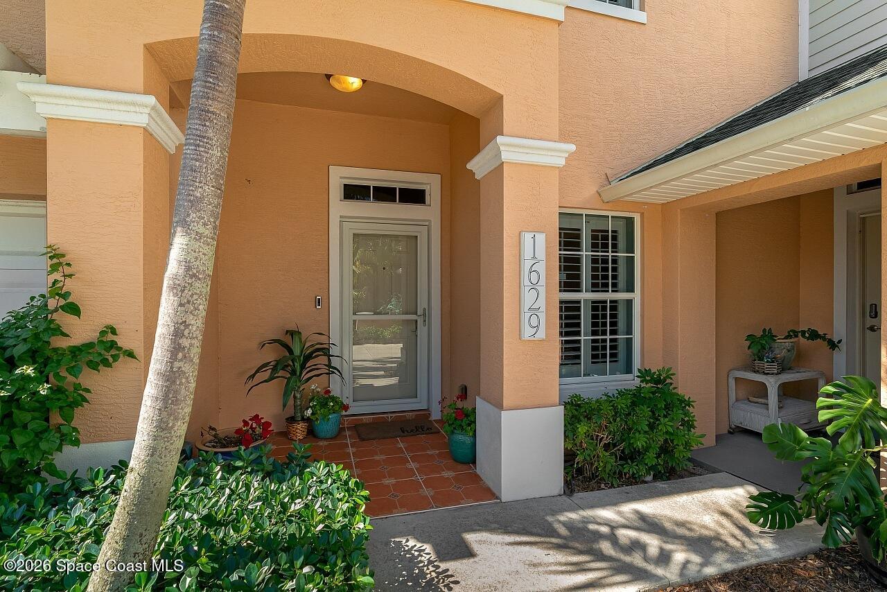 1629 Baseline Lane Vero Beach, FL 32967 - Photo 26 of 29 a front view of a house with a yard