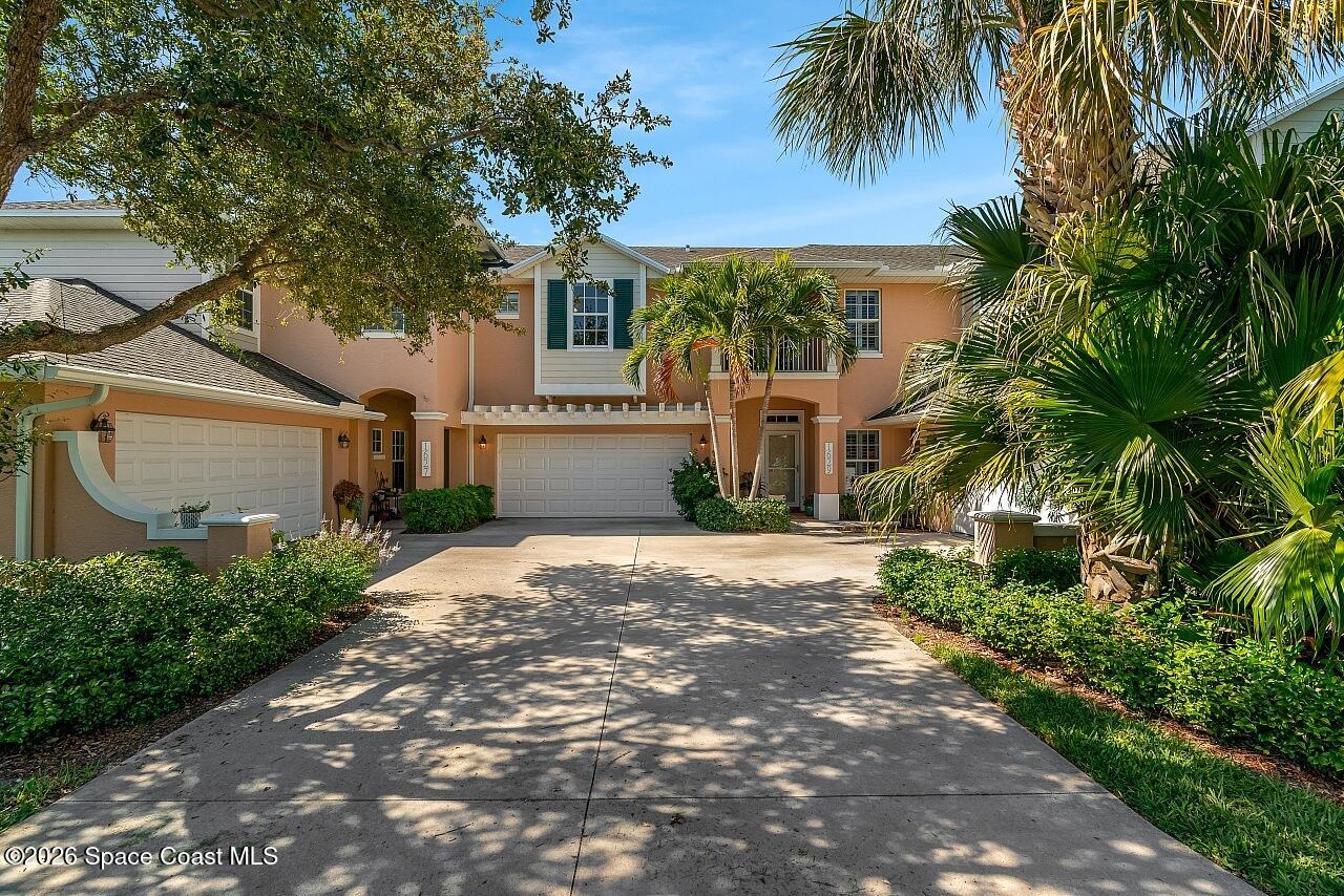 1629 Baseline Lane Vero Beach, FL 32967 - Photo 27 of 29 a front view of a house with a yard and garage