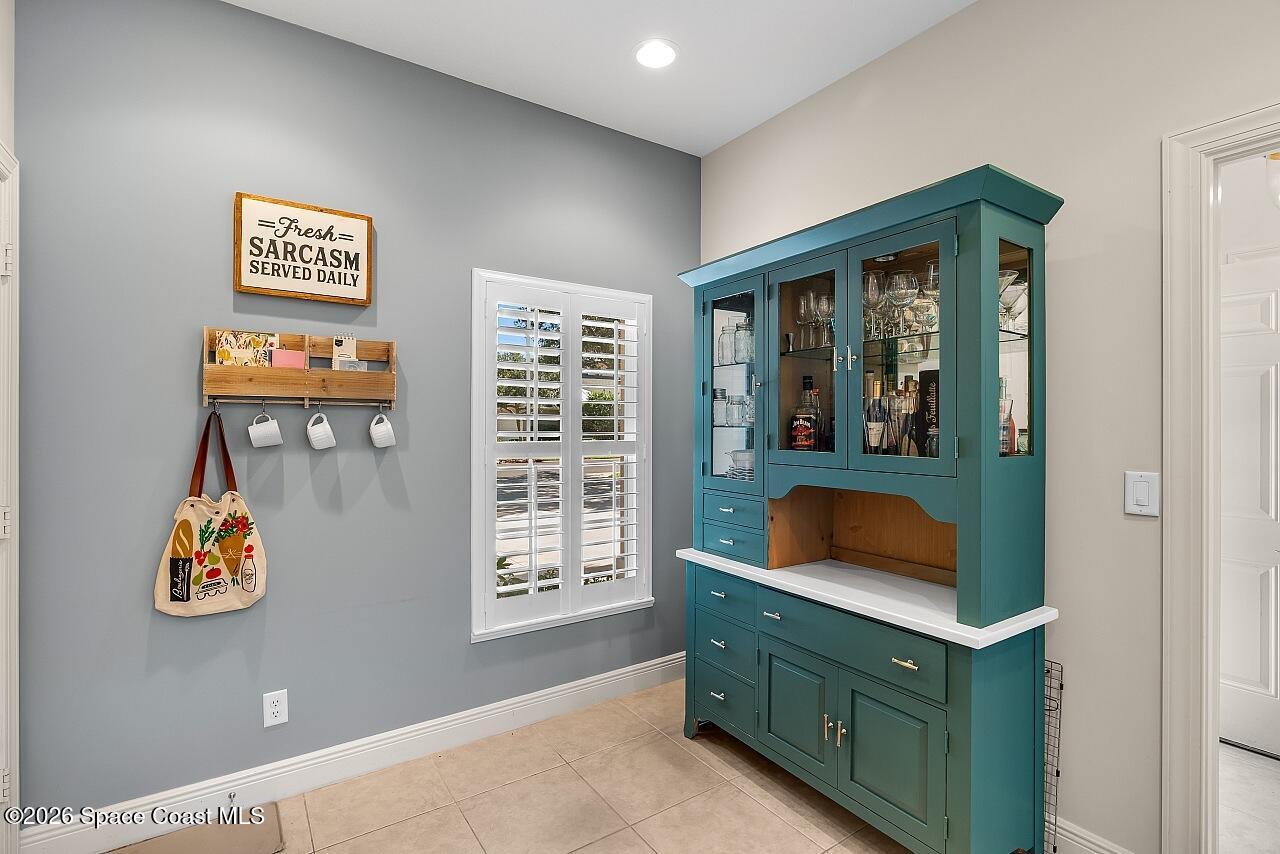 1629 Baseline Lane Vero Beach, FL 32967 - Photo 8 of 29 a room with window and cabinet