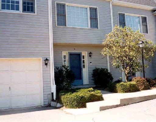 120 Prospect Street, Unit 39 Ridgefield, CT 06877 - Photo 1 of 1 a view of a house with potted plants