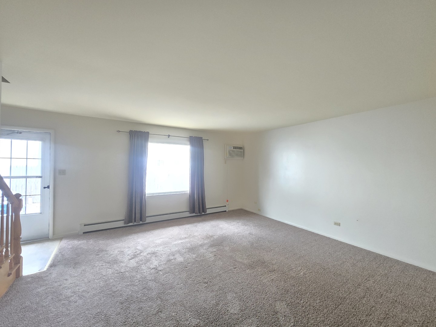333 Ida Avenue, Unit 3 Antioch, IL 60002 - Photo 2 of 9 an empty room with windows