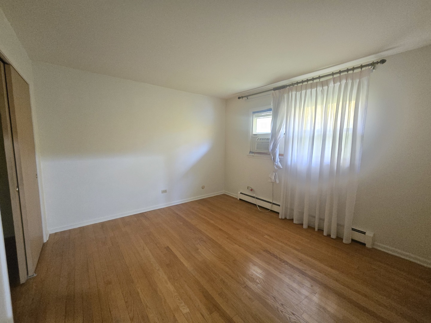 333 Ida Avenue, Unit 3 Antioch, IL 60002 - Photo 9 of 9 an empty room with windows