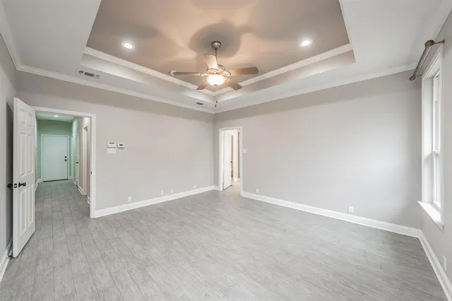 a bathroom with a double vanity sink mirror and shower