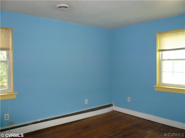 307 Wilkinson Road Richmond, VA 23227 - Photo 7 of 11 an empty room with a window