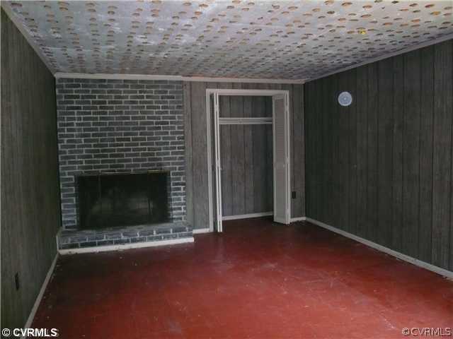 307 Wilkinson Road Richmond, VA 23227 - Photo 8 of 11 a view of empty room with fireplace