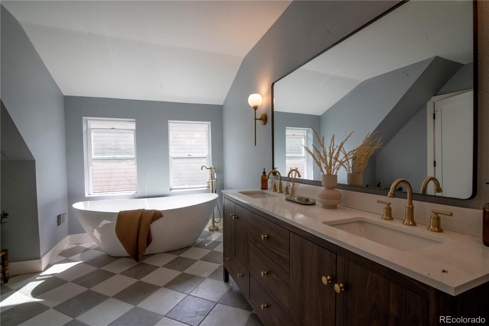 2831 Perry Street Denver, CO 80212 - Photo 21 of 29 a spacious bathroom with a double vanity sink mirror and bathtub