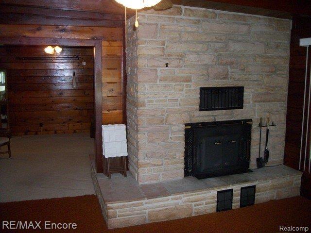 5041 Clarkston Road Clarkston, MI 48348 - Photo 10 of 29 Woodburner/fireplace in dining