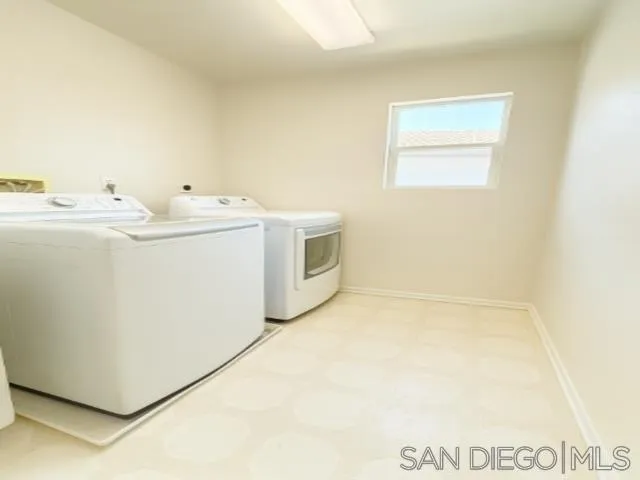 11855 Westview Parkway San Diego, CA 92126 - Photo 7 of 9 a utility room with dryer and washer