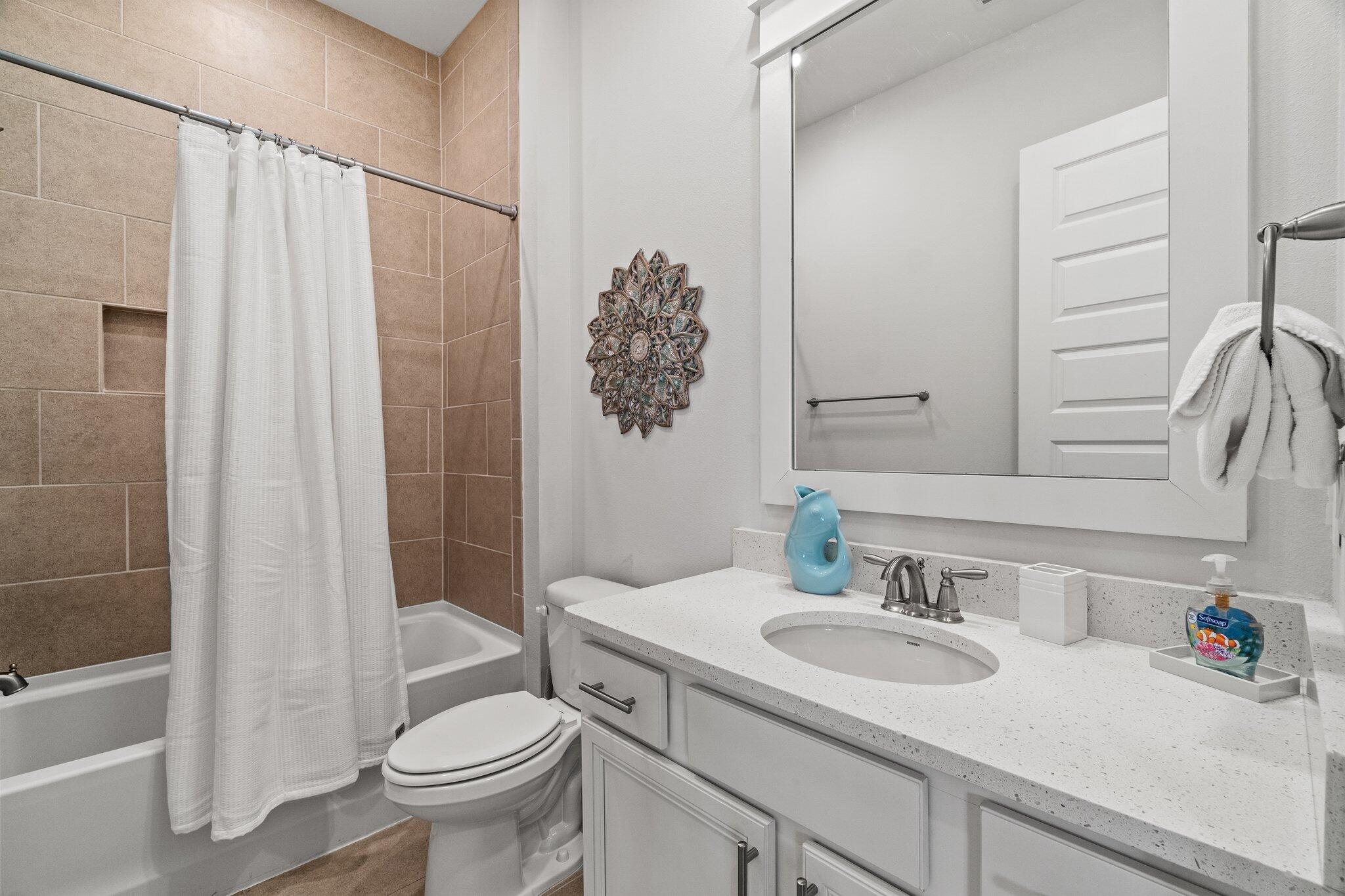 89 Pine Lands Loop Inlet Beach, Unit C Inlet Beach, FL 32461 - Photo 16 of 65 a bathroom with a sink toilet and shower
