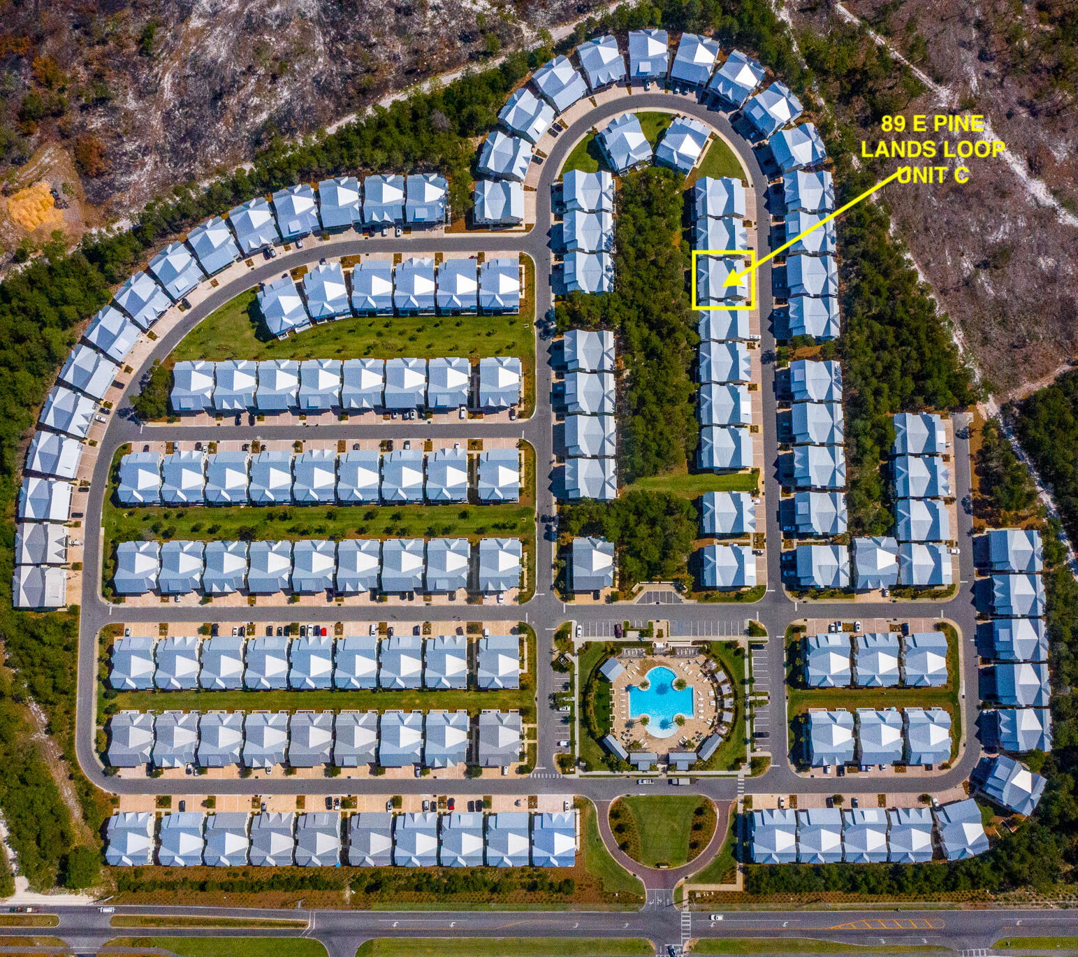 89 Pine Lands Loop Inlet Beach, Unit C Inlet Beach, FL 32461 - Photo 30 of 65 a building view with a swimming pool