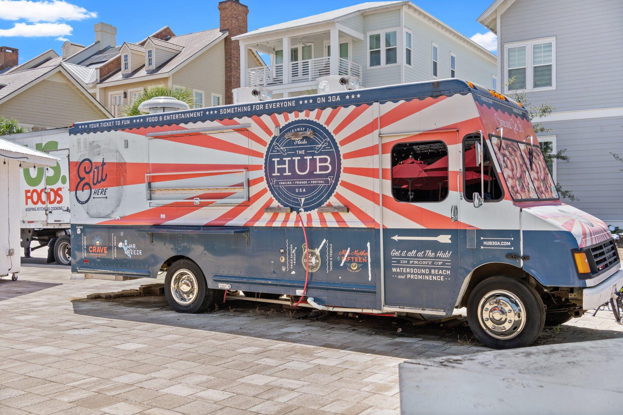 89 Pine Lands Loop Inlet Beach, Unit C Inlet Beach, FL 32461 - Photo 47 of 65 a front view of a building with parking space