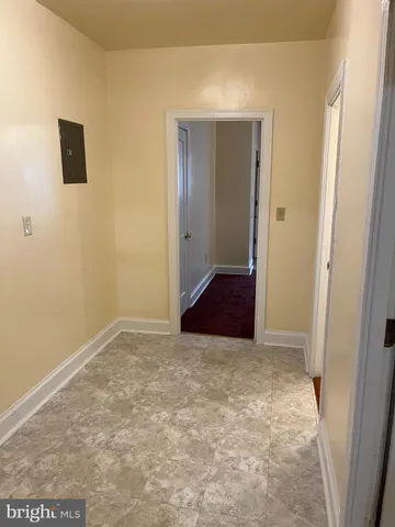 a view of an empty room with window