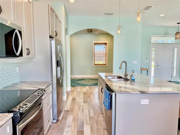 a view of a hallway view with staircase