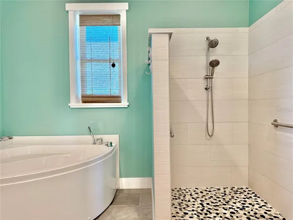 a view of a backyard with potted plants