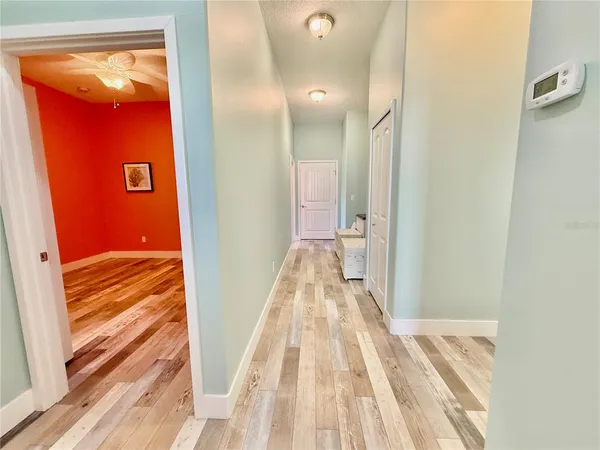 a view of a house with a yard porch and sitting area