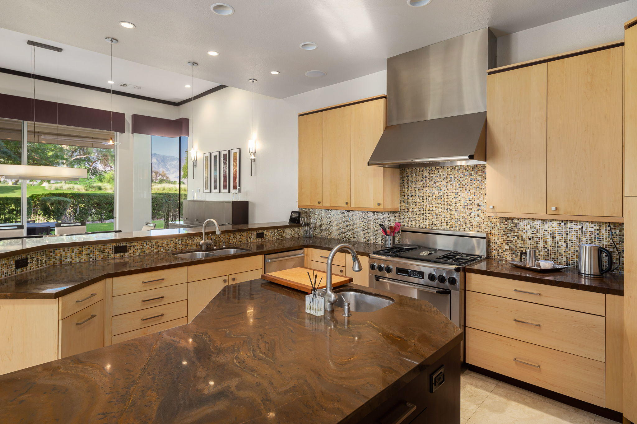 202 Loch Lomond Road Rancho Mirage, CA 92270 - Photo 13 of 47 a kitchen with sink stove and cabinets
