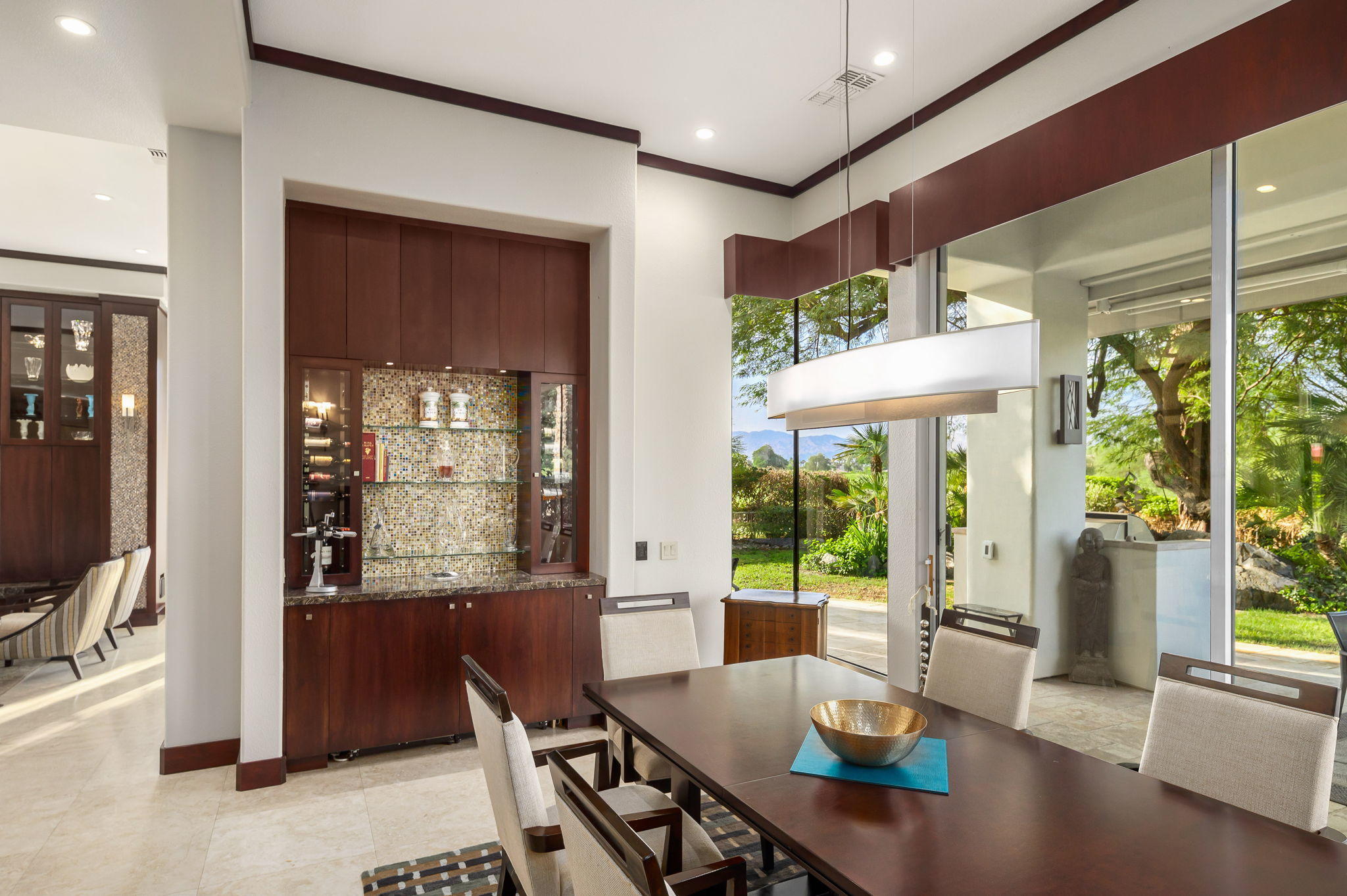 202 Loch Lomond Road Rancho Mirage, CA 92270 - Photo 16 of 47 a living room with furniture and a large window