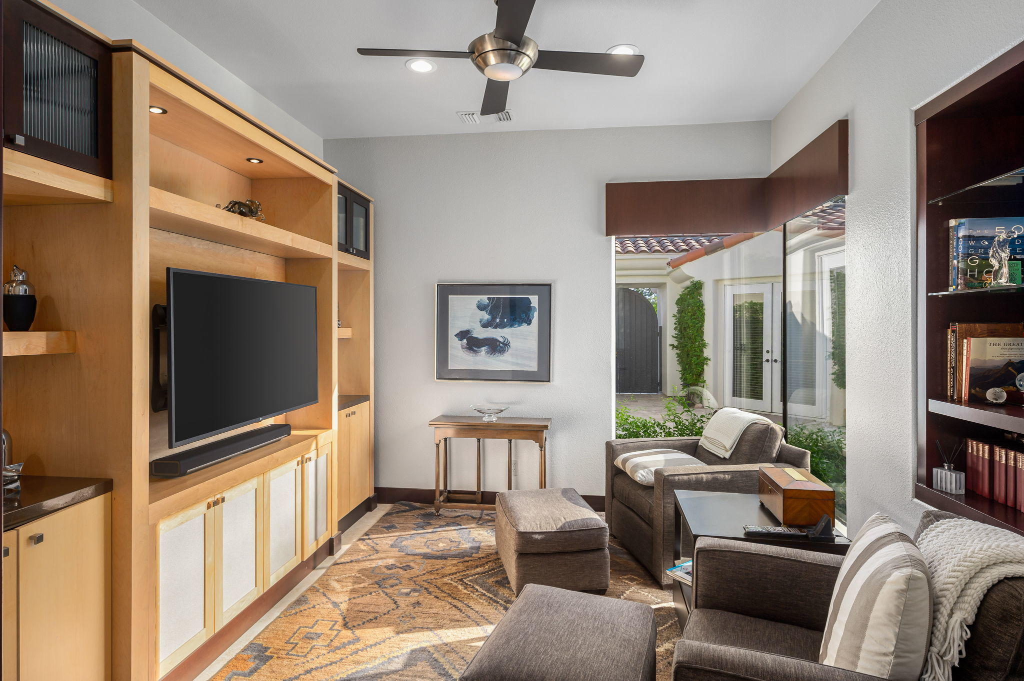 202 Loch Lomond Road Rancho Mirage, CA 92270 - Photo 17 of 47 a living room with furniture and a flat screen tv