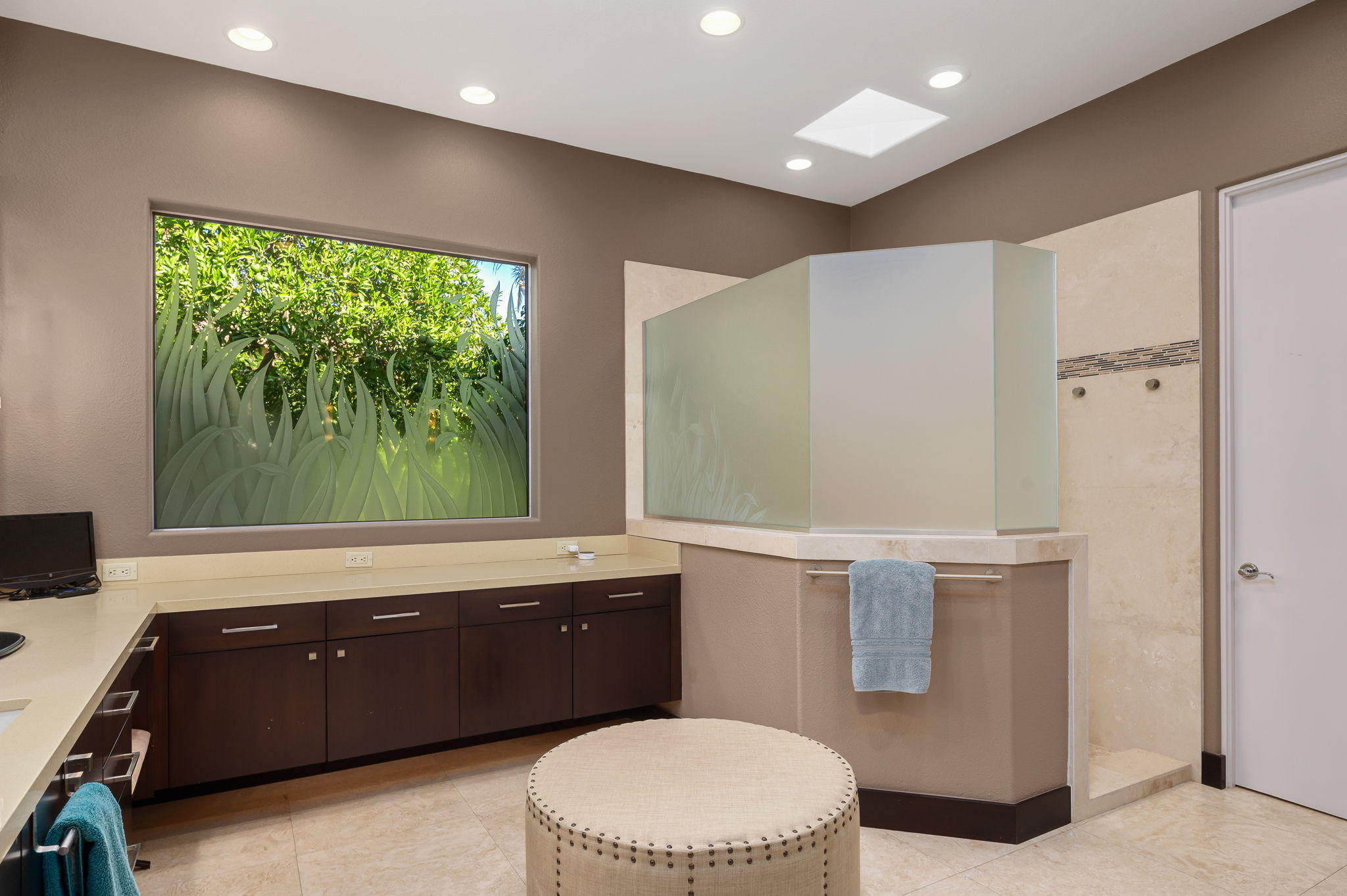 202 Loch Lomond Road Rancho Mirage, CA 92270 - Photo 20 of 47 a bathroom with a double vanity sink toilet and a window