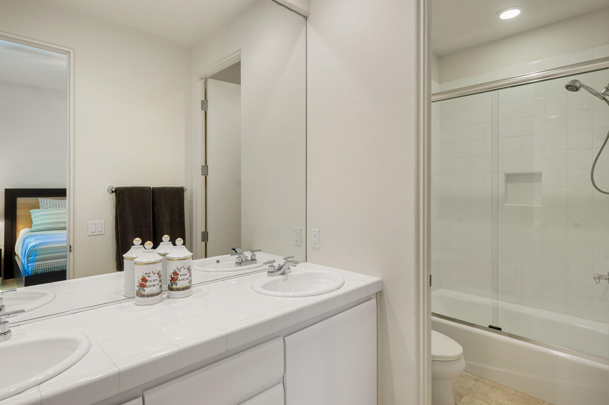 202 Loch Lomond Road Rancho Mirage, CA 92270 - Photo 23 of 47 a bathroom with a sink and a mirror