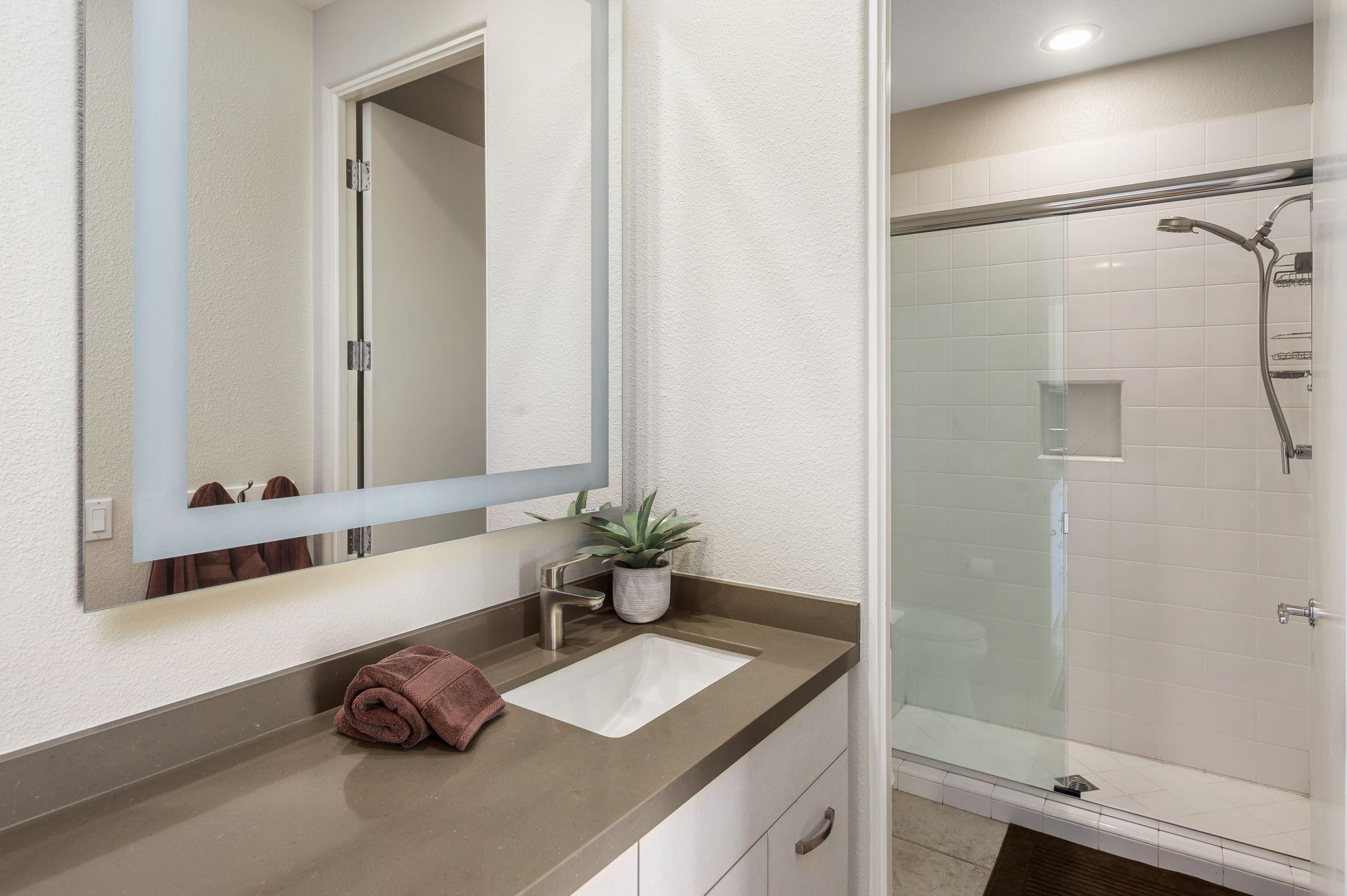 202 Loch Lomond Road Rancho Mirage, CA 92270 - Photo 29 of 47 a bathroom with a granite countertop sink and a mirror