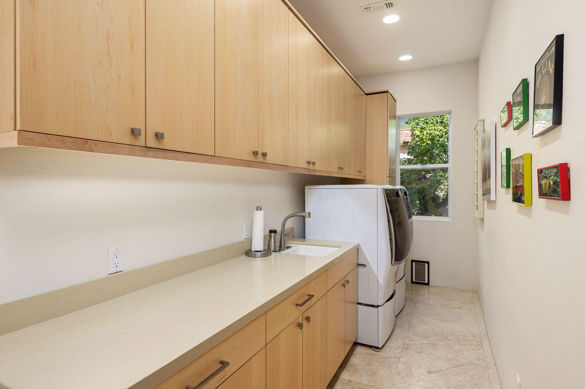 202 Loch Lomond Road Rancho Mirage, CA 92270 - Photo 30 of 47 a view of a kitchen with fridge and wooden floor