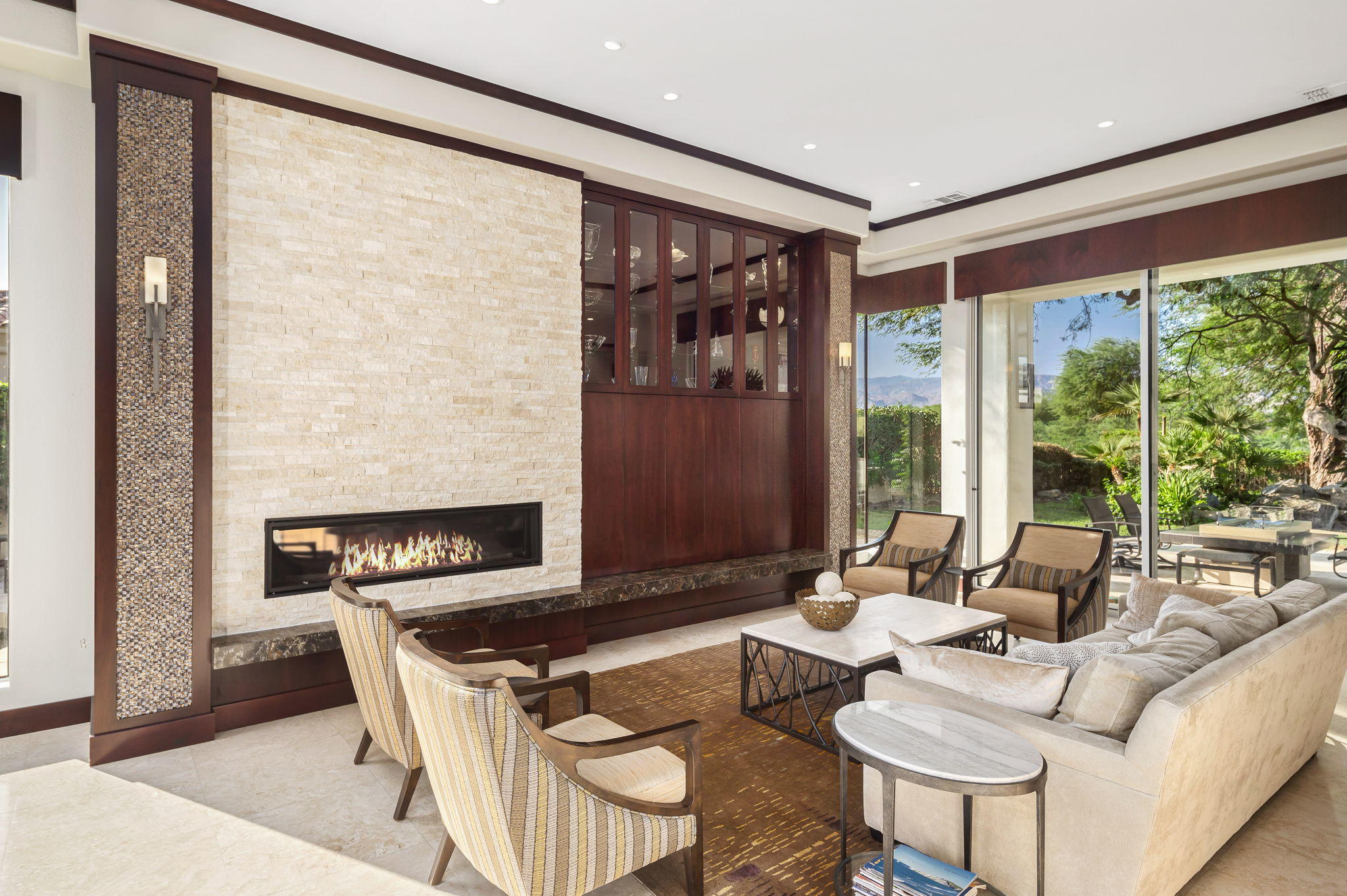 202 Loch Lomond Road Rancho Mirage, CA 92270 - Photo 7 of 47 a living room with fireplace furniture and a large window