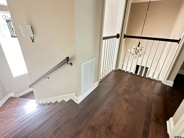 a bedroom with a bed and a fireplace