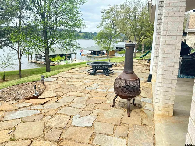 a view of a park with large trees