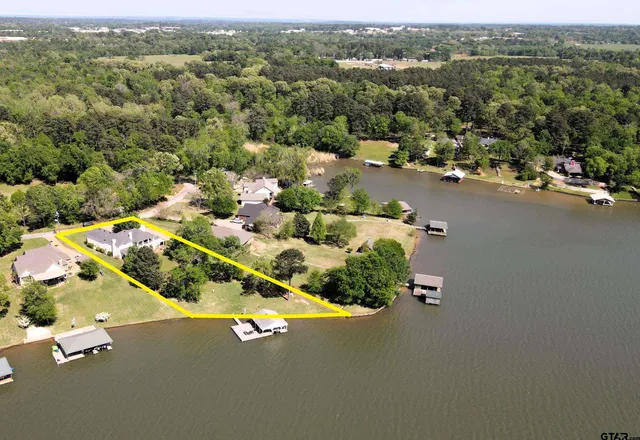 an aerial view of a house with a garden