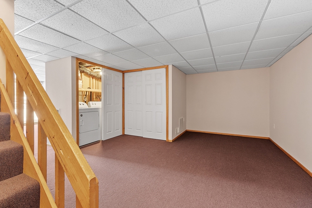 8 Deer Path, Unit 5 Maynard, MA 01754 - Photo 14 of 25 a view of an empty room with a window
