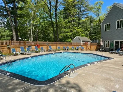 a view of a house with swimming pool