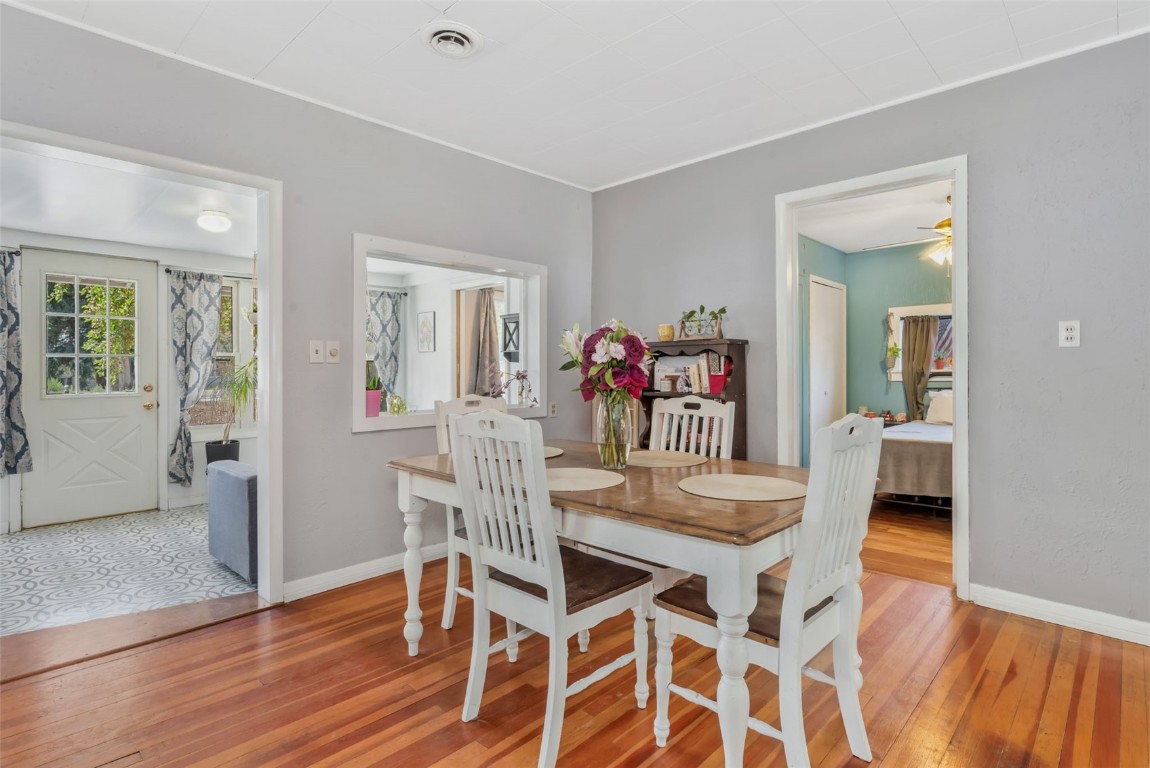 490 East Jefferson Avenue Hayden, CO 81639 - Photo 12 of 35 a view of a dining room with furniture and wooden floor