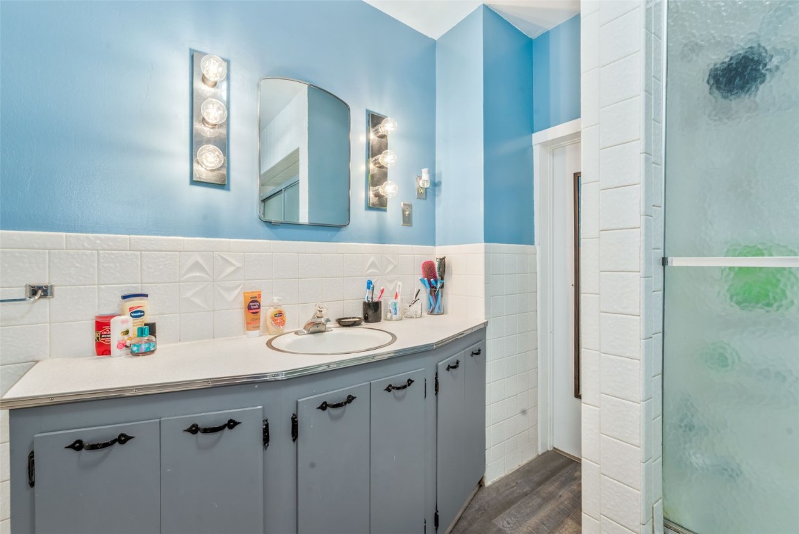 490 East Jefferson Avenue Hayden, CO 81639 - Photo 19 of 35 a bathroom with a sink and a mirror