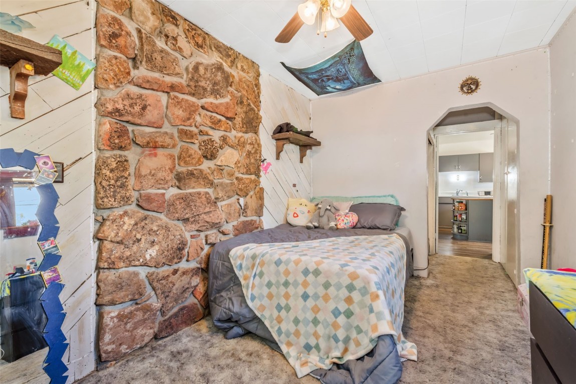 490 East Jefferson Avenue Hayden, CO 81639 - Photo 27 of 35 a bedroom with a bed and a mirror