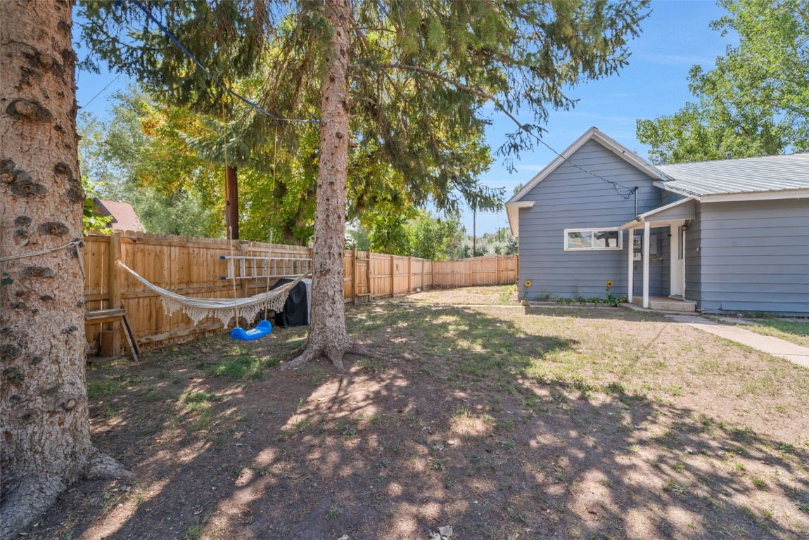 490 East Jefferson Avenue Hayden, CO 81639 - Photo 29 of 35 a view of a house with a yard