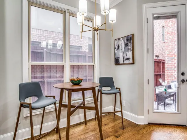 a view of a livingroom with furniture and window